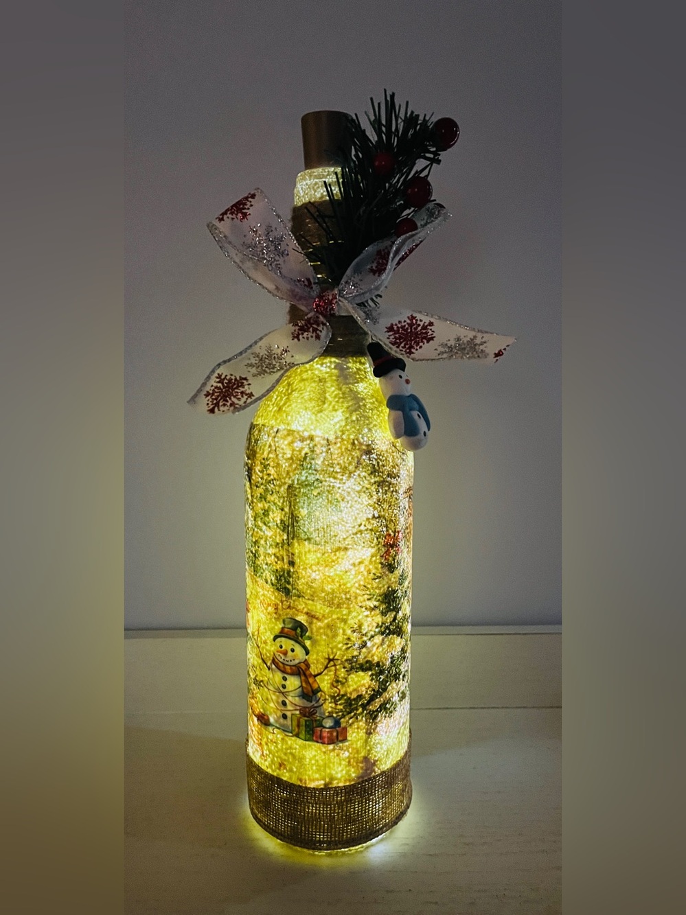 Lighted Yellow Snowman Bottle Décor with Ribbon Accent